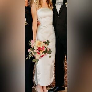 Simple white wedding dress with bow